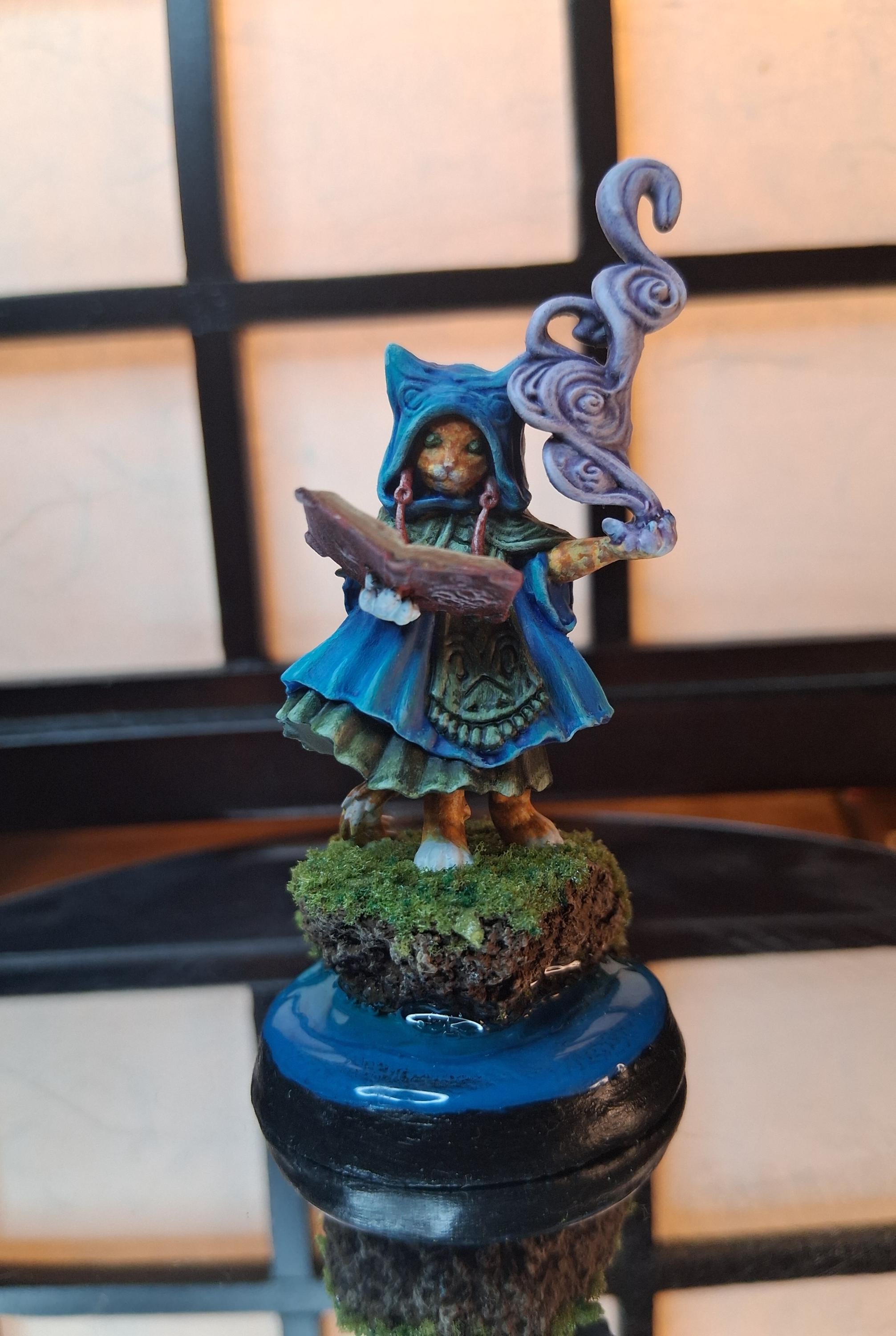 Unpainted catfolk warlock miniatures from an Etsy order