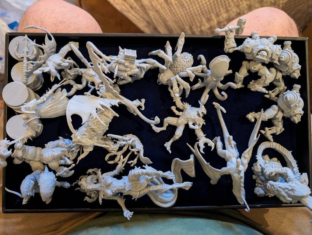 Tray of unpainted MiniMayhem miniatures from an Etsy order