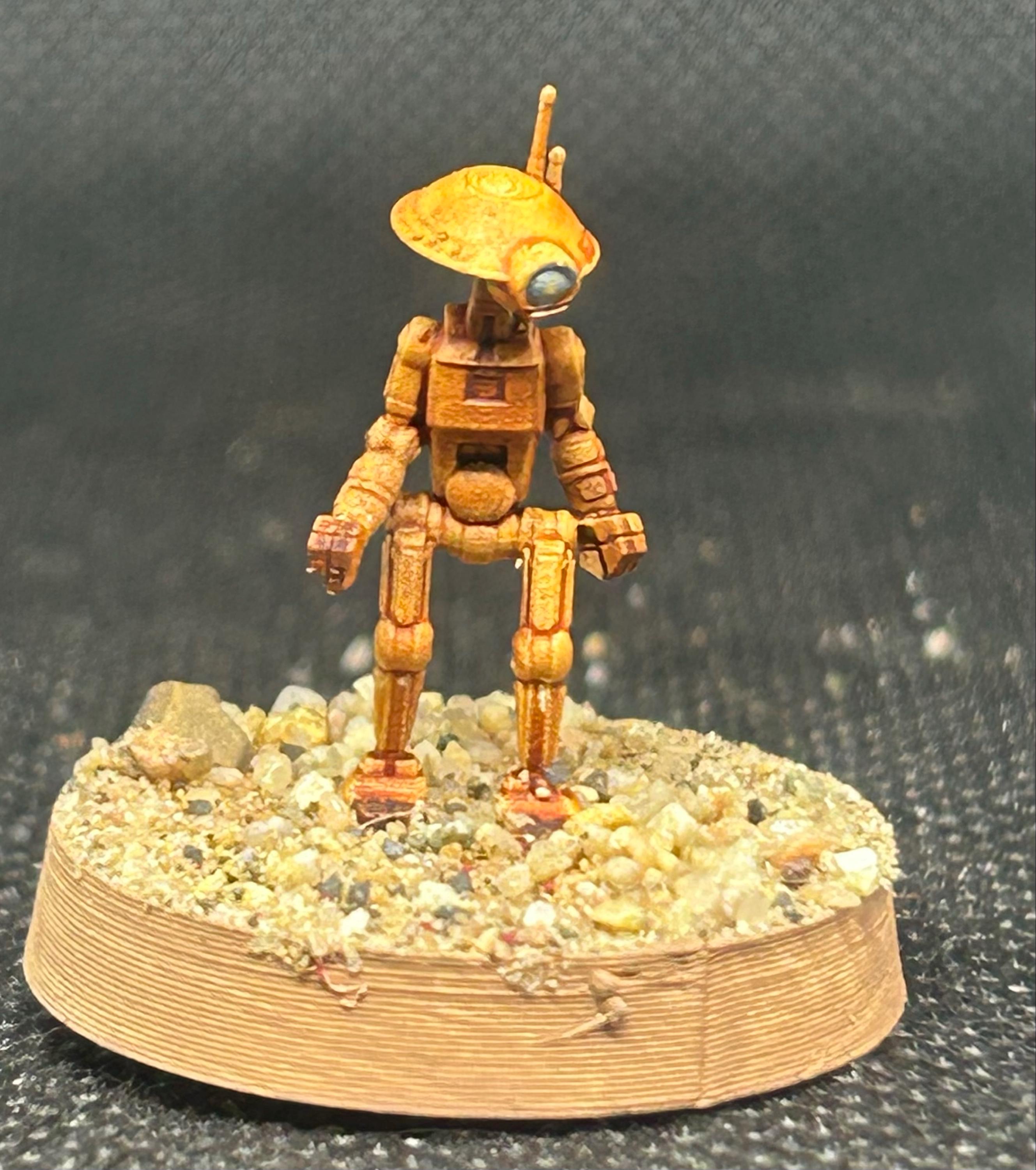 Customer-painted pit droid miniature from an Etsy order